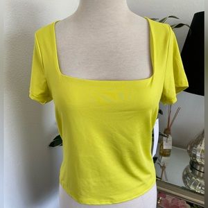 NWT Neon yellow, square neck shirt. Stretch fabric, size L.